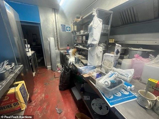 The kitchen in the takeaway was full of crockery, bin bags, cutlery and Tupperware