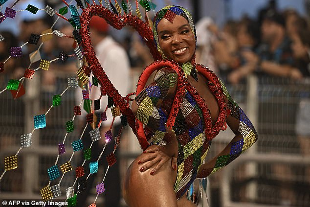 A reveler from the samba school Mocidade Alegre performs during the second evening of carnival
