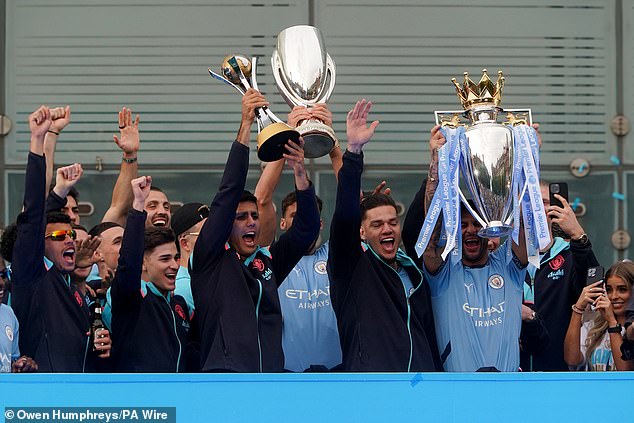 In addition to their league title, City also displayed the Club World Cup and Super Cup trophies
