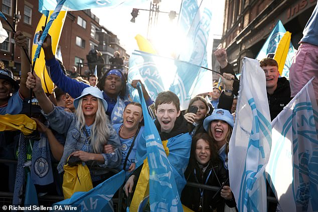 Thousands of City supporters took to the streets with flags and scarves to celebrate