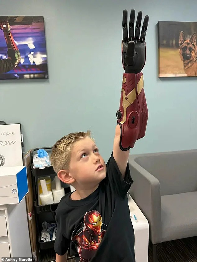Jordan Marotta couldn't wait to show off his bionic arm to his school friends, made in the colors of his favorite superhero Iron Man