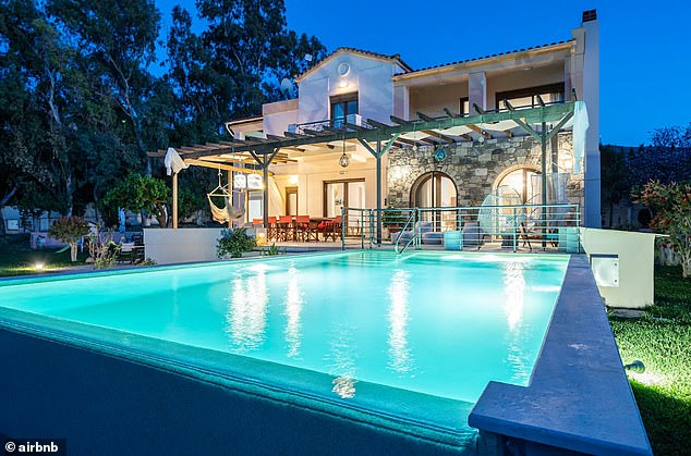 Pictured is one of O'Neill's properties, a sprawling seven-bedroom house on a Greek island