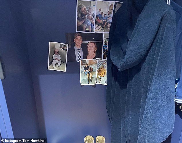 The footy star says his mother is never far from him and his family.  He keeps a photo of the couple in his locker in Geelong (pictured)