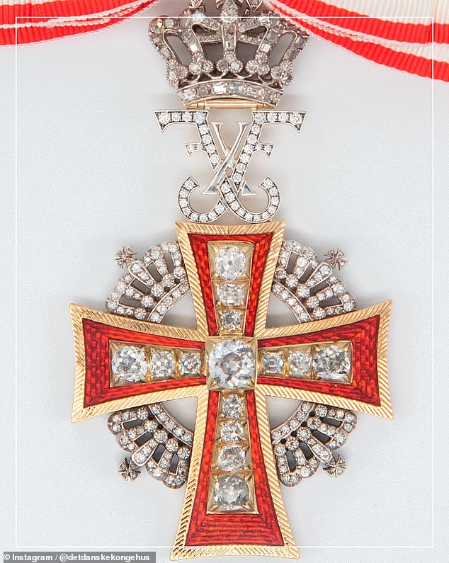 The king honored his Australian-born queen with the Grand Commander's Cross of the Order of the Dane
