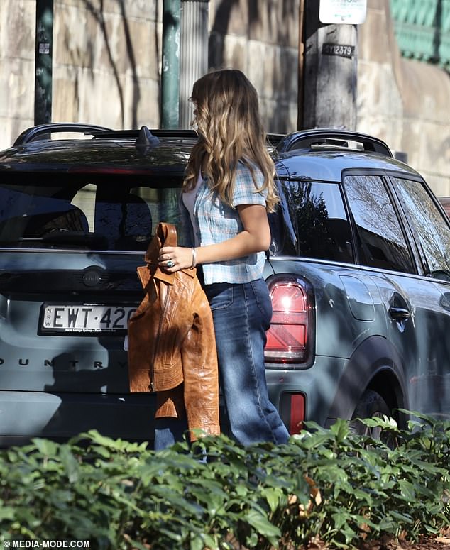 The teen appeared to go makeup-free during the outing and teamed her look with brown boots and accessorized with silver rings on her fingers