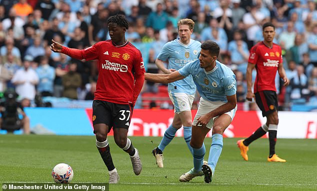 Mainoo, pictured in the photo holding off Rodri at Wembley, starred at the heart of United's team