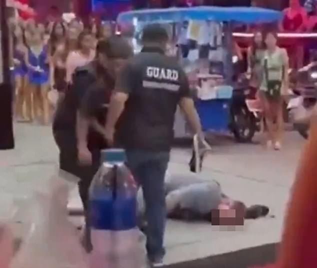 Footage from another angle showed his gray-shirted compatriot also briefly knocked unconscious by another bouncer, who kicked him in the jaw as he tried to get up after being tackled to the ground.