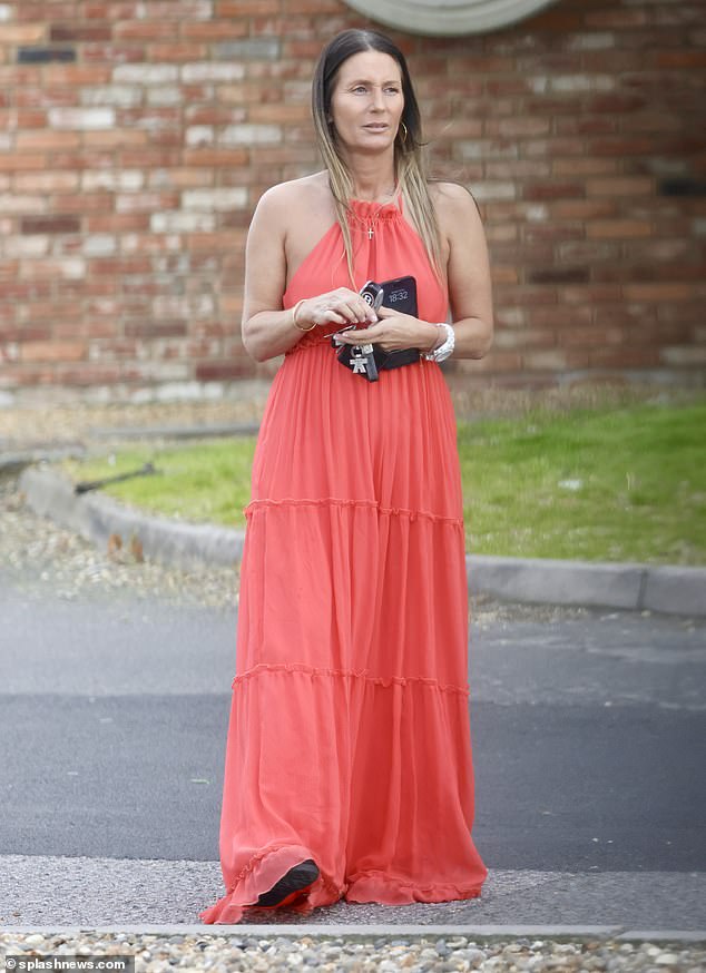 The actor was accompanied by his wife Joanne, who looked every bit the stylish grandmother in a pleated red maxi dress