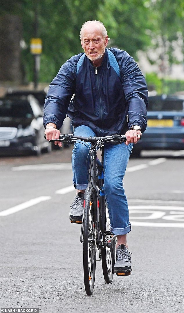 Pictured: Game of Thrones actor Charles Dance cycled through the streets of Camden in 2019