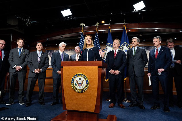 Rich McCormick pictured himself smiling at Van Duyne during a press conference at the Capitol last June