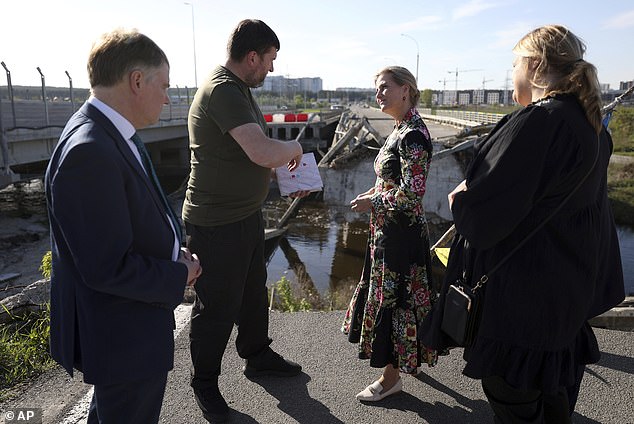 Sophie, Duchess of Edinburgh, and the United Kingdom's Ambassador to Ukraine Martin Harris, left, visit the Romanivska Bridge in the city of Irpin on Monday, April 29, 2024, amid the Russian invasion of Ukraine