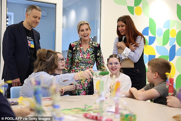 Sophie meets children while visiting the NGO's Family Center 