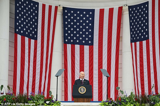 Biden reflected on the loss of his own son Beau as he delivered remarks honoring military members in Arlington's auditorium