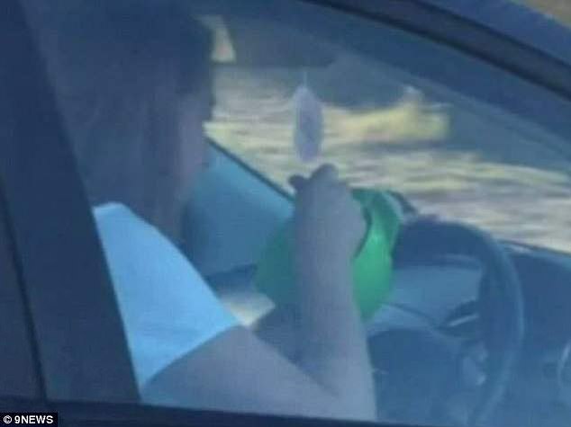 A hungry teenage driver (pictured) was fined $300 after eating cereal behind the wheel in Perth