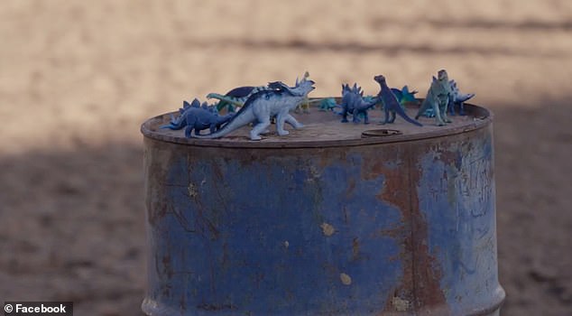 During the rodeo finals, children placed small toy dinosaurs on the play equipment