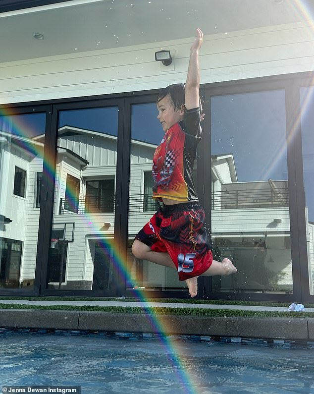 She also took a photo of her son Callum, four, in the air as he jumped into a pool