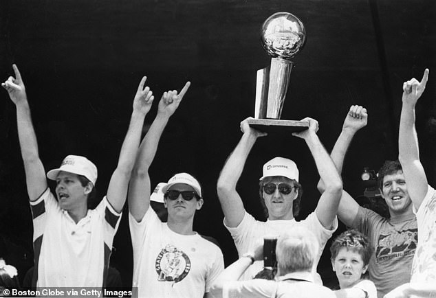 Walton (far right) with Celtics teammates Danny Ainge, Rick Carlisle and Larry Bird in 1986