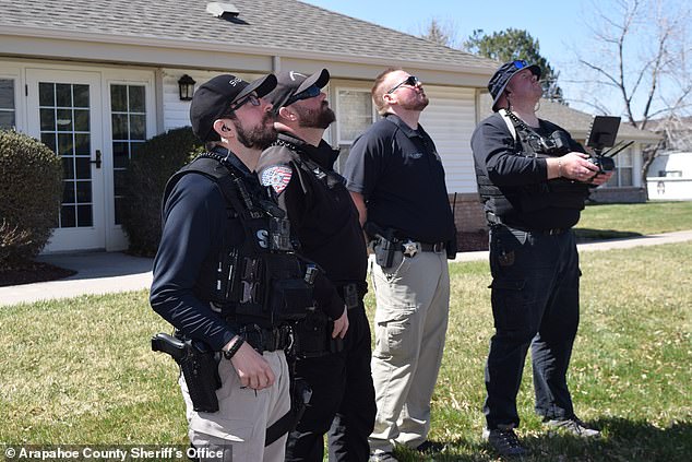 The Arapahoe County Sheriff's Office, based in Centennial, Colorado, has been using the robotic flying devices since 2017. (Photo: Officers testing a drone)