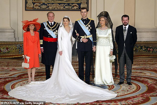 Pictured: King Felipe and Queen Letizia and their parents on the couple's wedding day in May 2004