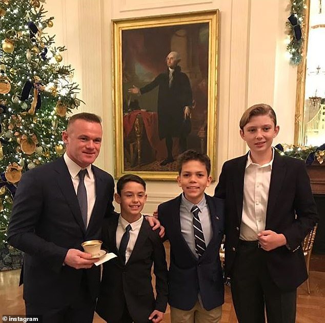 Rooney - pictured in 2018 - was asked to give football lessons to Trump's son, Barron (right)