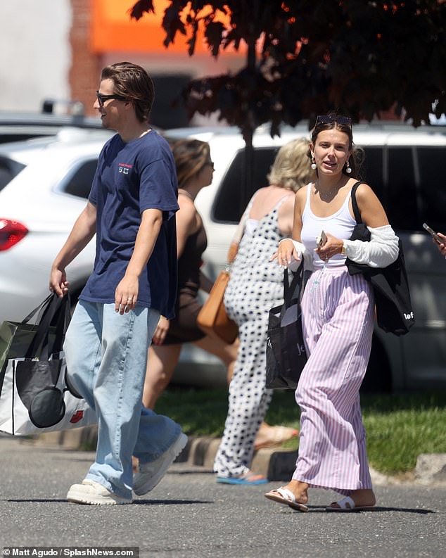 Millie's parents and Jon attended the secret ceremony, which was 'a very quiet, romantic affair with their immediate family with them as they said their vows'