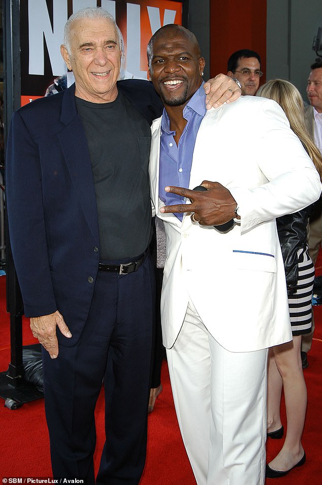 And here Ruddy put his arm around Terry Crewes at the premiere of The Longest Yard