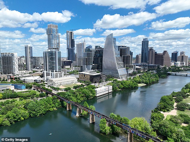 Texas has the largest population of native-born residents;  82 percent of people born in the state choose to stay there, U.S. Census analysis shows.  Pictured: An aerial view of Austin, the capital of Texas