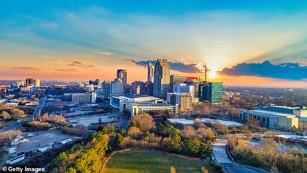 North Carolina retains 75.5 percent of its indigenous population.  Experts say that, like Texas, North Carolina residents have a “strong sense of community and pride in where they come from.”  Pictured: An aerial view of Raleigh, the capital of North Carolina