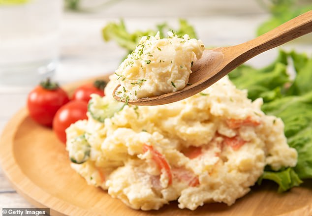 Then Dr. warned.  John Beach Lovers for the Dangers of Anything Mayonnaise-Based, Like Potato Salad (stock image)