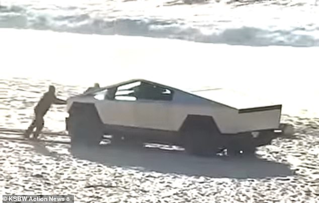 A California driver ignored the 'No vehicles on beach or dunes' sign and ended up driving his Cybertruck onto the beach and getting stuck in the sand