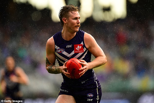 Cam McCarthy (pictured playing for the Dockers in 2018) was remembered as 'the light in every room' he walked into