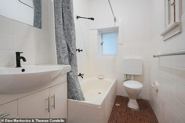 Features include a modern kitchen and a well-appointed bathroom.  (Pictured)