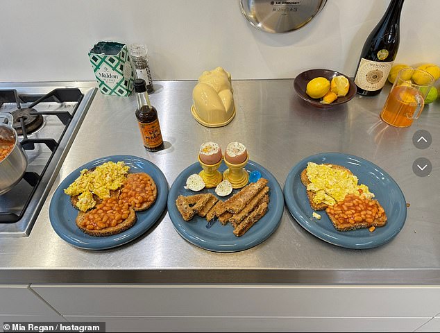 Mia may have moved in with friends, judging by the three plates laid out at breakfast, laden with toast, eggs and beans on her kitchen counter.