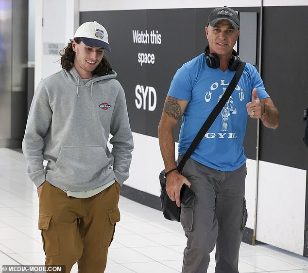 The Australian Idol favorite looked every bit the Aussie rocker and even shared a thumbs up as he made his way through the airport