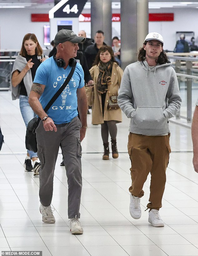 Blake, 21, also opted for a casual ensemble for the flight, wearing a gray Dickies hoodie and tan cargo pants