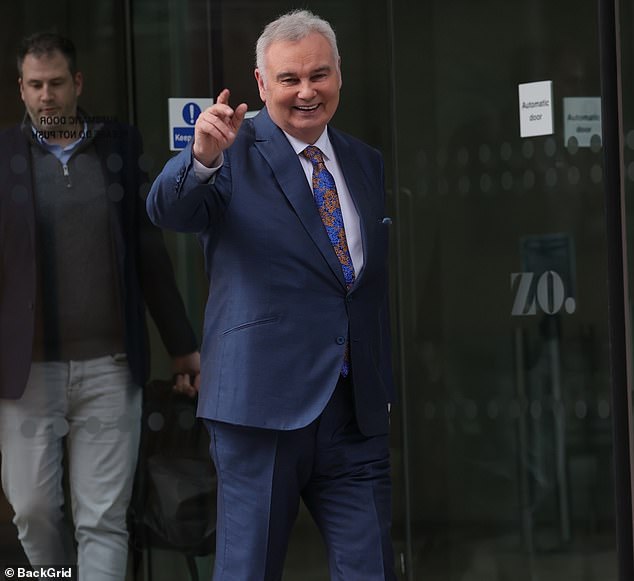 Holmes pictured leaving GB News on his first day at the broadcaster in 2022. One of his colleagues said last night: 'Eamonn was the cheeky star of daytime television, he was a confident and vocal member of the team'