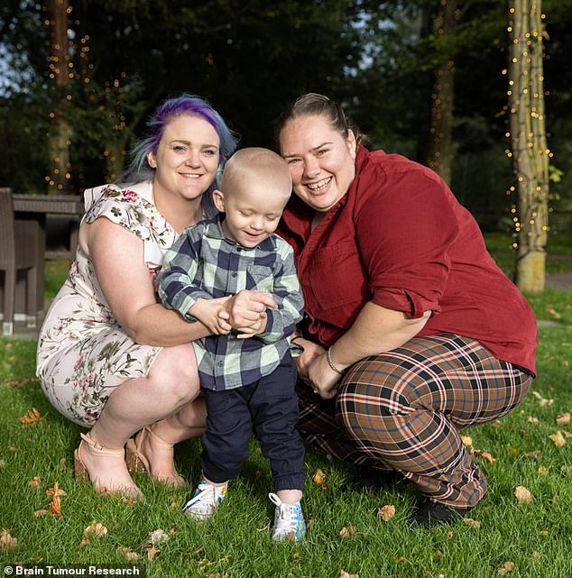 Here doctors believed he had tonsillitis or epilepsy and referred Albie to neurology, his mothers Lauren and Hayley Bayliss-Watts (pictured) claimed.  However, just six weeks later, before a follow-up appointment with a consultant, he started vomiting blood