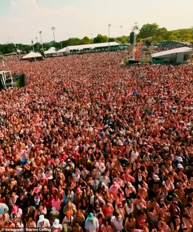 An overhead drone shot of the sheer number of people gathered in this small area to listen to Chappell Roan's set.  Roan performed before Megan Thee Stallion