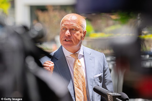 Steve Romines, attorney for golfer Scottie Scheffler, speaks to the press on Wednesday