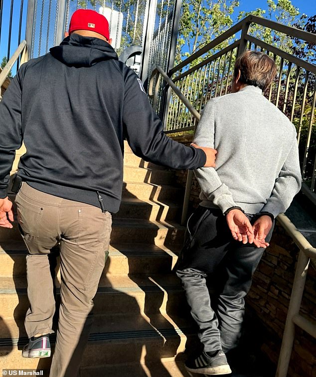 Lee was handcuffed and taken away by police officers in Diablo on Tuesday