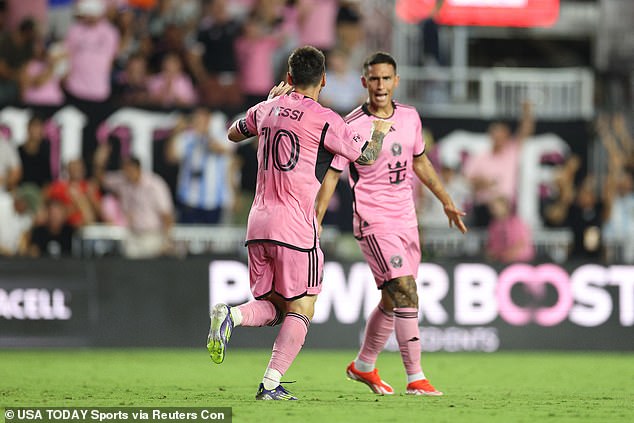 Lionel Messi celebrates after scoring a goal against Atlanta United in the second half