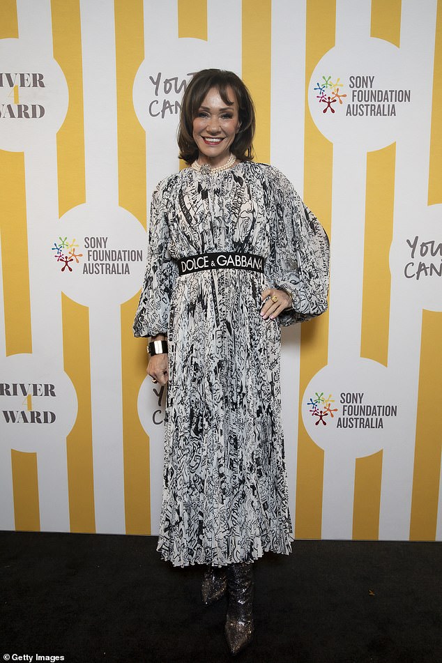 Ann Peacock looked glamorous in a long black and white dress which she paired with a Dolce and Gabbana belt