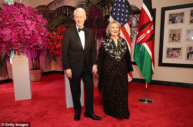 McLean said he spent time with former President Bill Clinton (pictured with Hilary Clinton at the dinner) at the state dinner and country singer Brad Paisley, who performed at the event