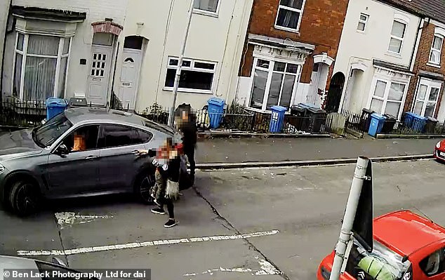 The woman is then seen talking to a passing motorist, without any connection to the mother, who offers to take the child straight to the hospital.