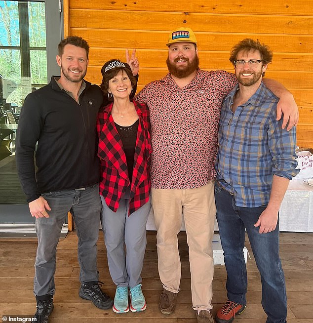 Johnny Wactor (left) pictured with his family, who are now preparing to take his body to South Carolina where they will mourn him