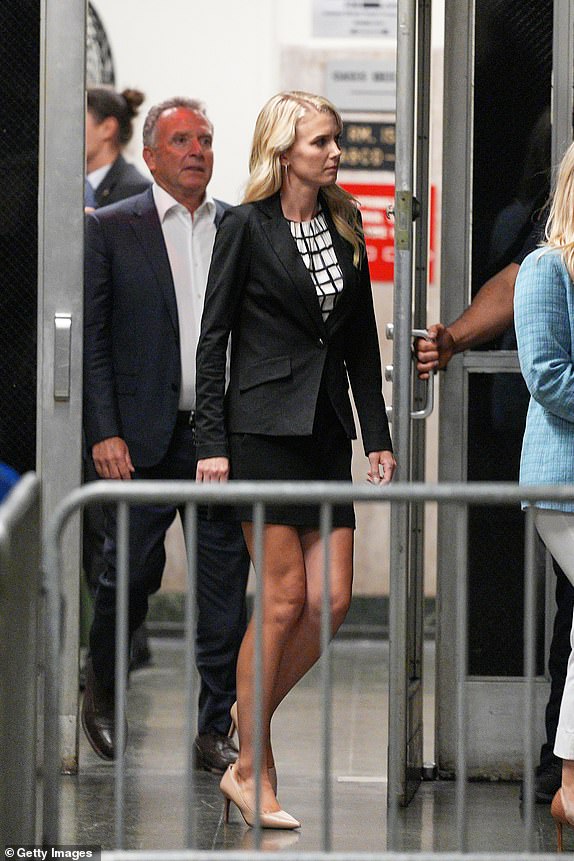 NEW YORK, NEW YORK - MAY 29: Communications assistant Natalie Harp returns from a break in the criminal trial of former US President Donald Trump at Manhattan Criminal Court on May 29, 2024 in New York City.  The former president faces 34 felony counts of falsifying company records in the first of his criminal cases to go to trial.  (Photo by Curtis Means - Pool/Getty Images)