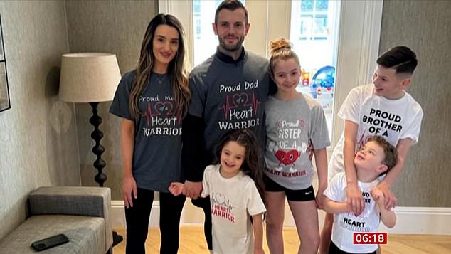 Jack and Andriani Wilshere (pictured) with the family in 'heart warrior' t-shirts dedicated to Siena