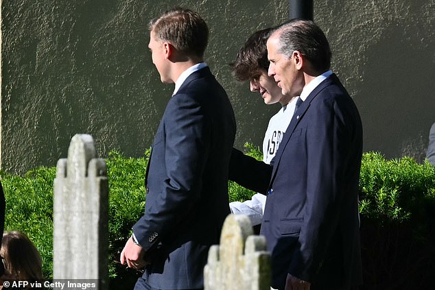 The president, his wife Jill, his son Hunter and other Biden family members walked by Beau's grave after attending a private ceremony marking his death