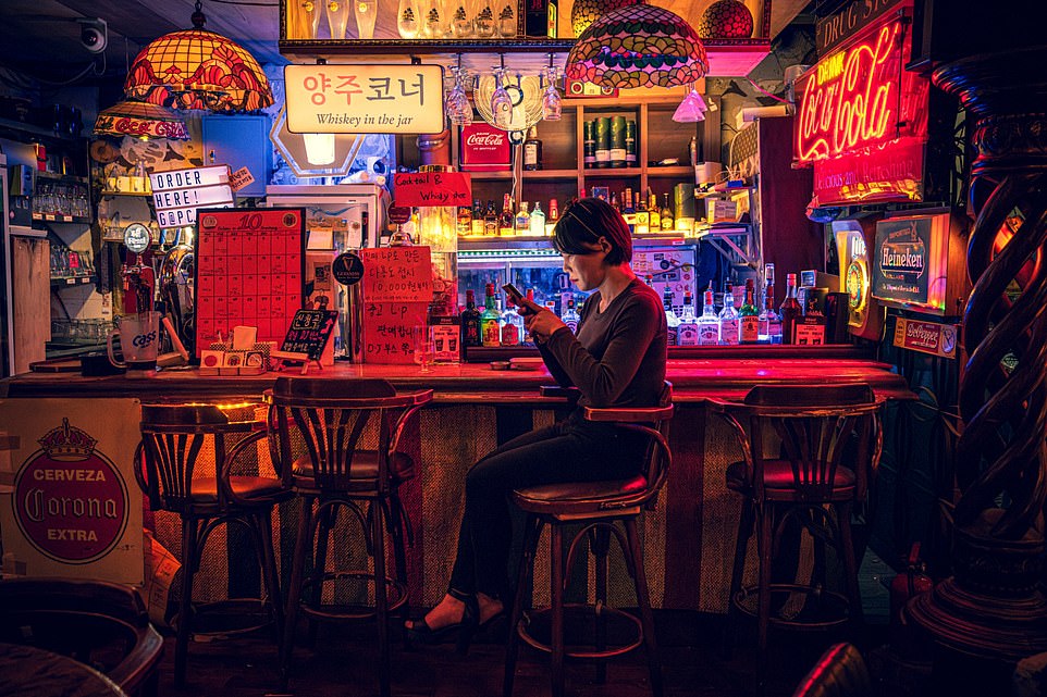 SEOUL, SOUTH KOREA: This richly colored basement bar was featured in the heartbreakingly beautiful film Return to Seoul, which tells the story of a young woman, adopted by French parents, who returns to South Korea to find her biological family