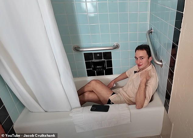 Jacob tests the small bath in the hotel room